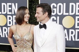 Irina e Bradley juntos em festa após separação  