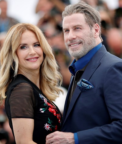 John Travolta perde mulher... e a fé