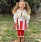 Benedita, a filha de Ana Garcia Martins, mascarou-se de balde de pipocas