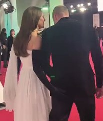 Kate Middleton apalpa William em público